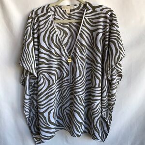 Michael Kors green and white zebra striped top with gold neckline zipper